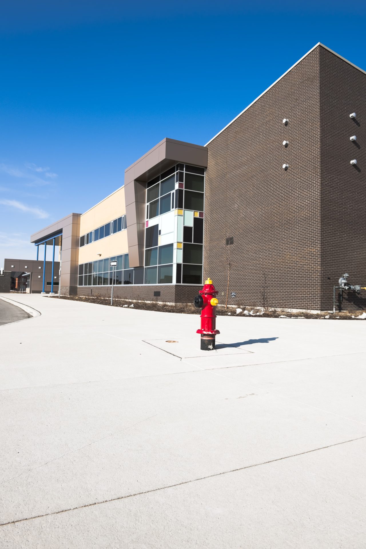 Commercial building requiring heating and plumbing system installation and maintenance